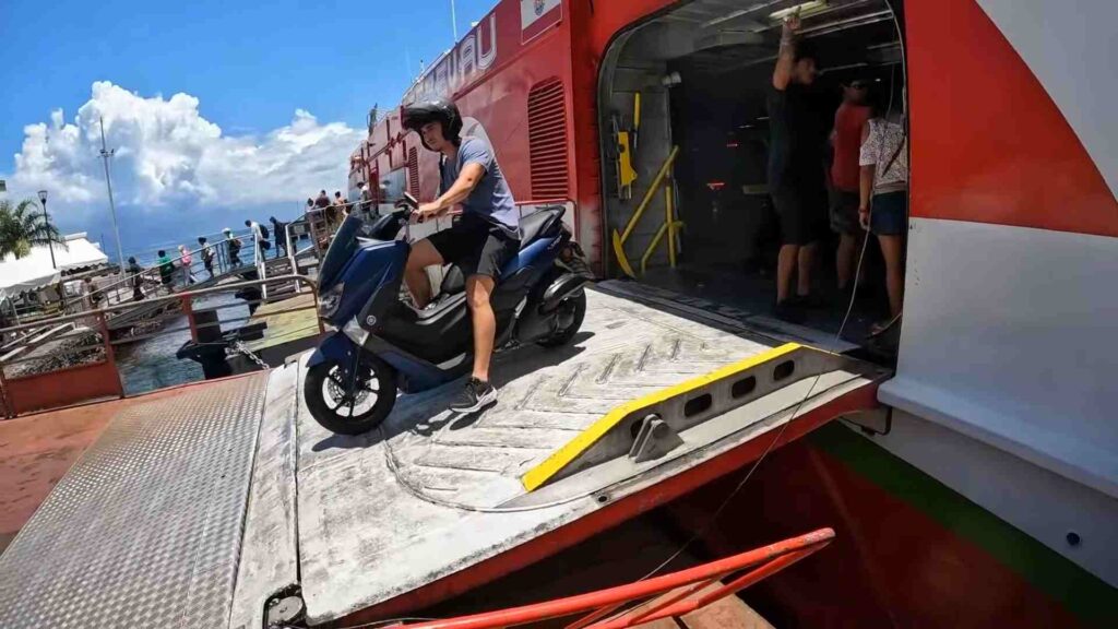 scooter offloading from ferry to Moorea