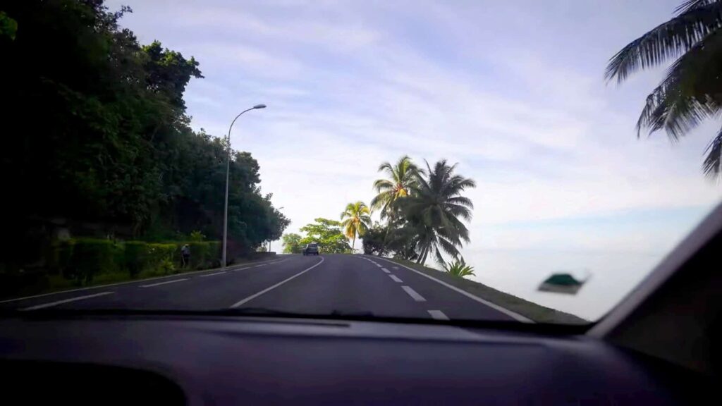 Driving on a highway to Tahiti car rental places